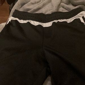 Adidas track pants. Black. Size XS, zipper pockets and ankles